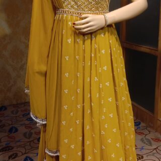 Yellow embroidey gown for all occasions – parties, engagements, birthdays, mehndi, and more. Versatile and attractive. Code: WGN00361. Contact: 7707014061.