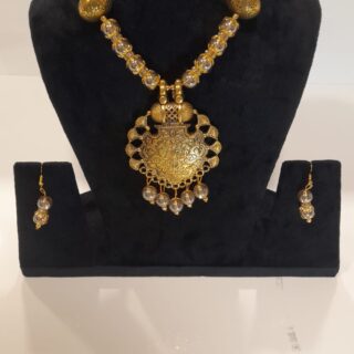 Golden Necklace set party wear set for engagements, mehndi, and haldi ceremonies. Use code WNS00031 to get yours. Contact via WhatsApp at 7707014061.