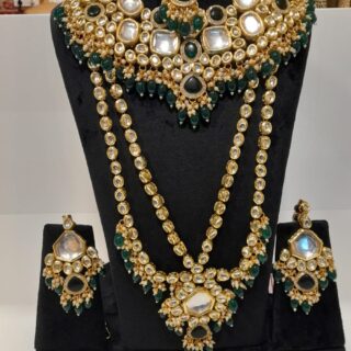 Green kundan bridal set party wear set for engagements, mehndi, and haldi ceremonies. Use code WBR00011 to get yours. Contact via WhatsApp at 7707014061.